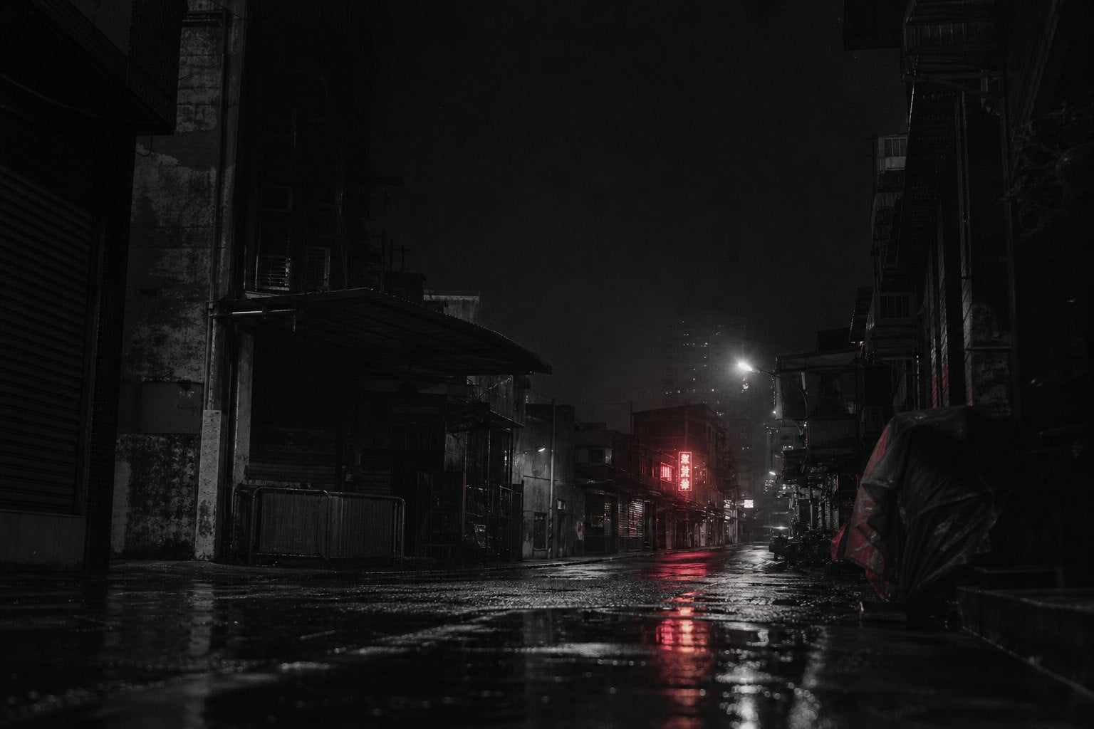 Rain-slicked East Asian street at night with distant red neon